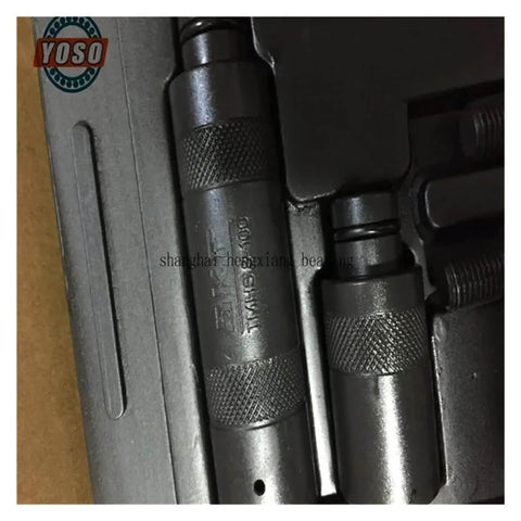 Close-up of Bearing Fitting Tool Kit TMFT 36 For Auto Maintenance And Engine Work Includes Durable Sleeves And Wrenches