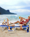 People relaxing on a 3-In-1 Beach Chair With Face Holes And Folding Side Table Outdoor Lounger With 5-Position Recliner Lay Flat Mode on a beach