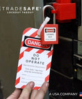 Heavy Duty Lockout Tagout Tags With Nylon Zip Ties Osha Compliant Danger Do Not Operate Signs on industrial equipment.