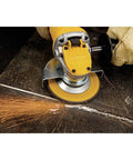Powerful 9 Amp Four And A Half Inch Angle Grinder With Paddle Switch And 12,000 RPM Motor cutting metal with sparks