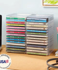 Stackable Clear Plastic CD Organizer With Rubber Feet For Home Theater Or Media Room, Holds Up To 30 Jewel Cases, BPA Free Durable American Made Design For Neat, Easy Access, Shelf Friendly Storage, shown holding 30 CDs on desk