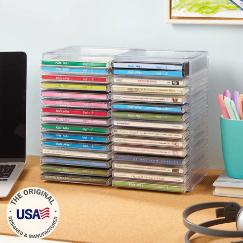 Stackable Clear Plastic CD Organizer With Rubber Feet For Home Theater Or Media Room, Holds Up To 30 Jewel Cases, BPA Free Durable American Made Design For Neat, Easy Access, Shelf Friendly Storage, shown holding 30 CDs on desk