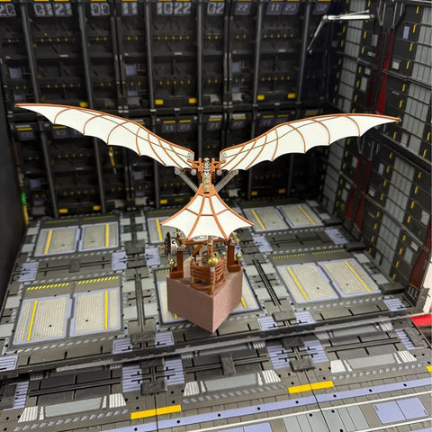 Da Vinci Flapping Wing DIY Model Kit 3D Metal Wind Up Ornithopter in a mechanical setting