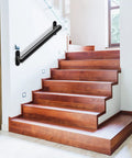 Hardcore 16 Inch Wall Mount Metal Handrail For Stairs Rock Steady Non Slip Safety Grab Bar For Elderly Indoor Outdoor Steel Support Railing With No Sweat Setup Black installed on wooden stairs.