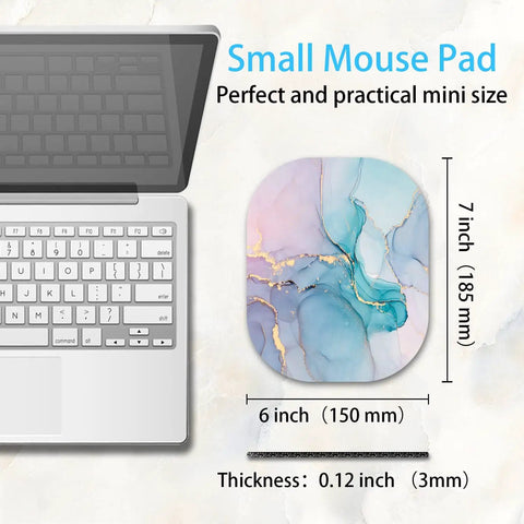 Compact 6x7 Inch Mouse Pad For Laptop And Keyboard Tray, Cyan Blue Marble design next to laptop, showing non-slip rubber base, 3mm thick