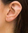 Hypoallergenic Flat Back Earrings For Women 14K Gold Plated Mini Stud Set Of 3 Pairs Featuring Star Moon Sun Shapes Flat Back Cartilage Helix Piercing Jewelry Includes 4mm And 5mm Sizes For Daily Mix And Match. Moon, star and sun flat back studs on ear