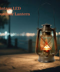Vintage LED Outdoor Lantern With Dancing Flame Wick on stone surface at night, glowing softly in the dark, bronze finish.