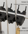 Close-up of Versatile Mobile Commercial Mop Rack With Broom Holder And 8 Slots Cleaning Tool Cart hooks for small objects.