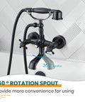 Oil Rubbed Bronze Wall Mount Clawfoot Bathtub Faucet With Handheld Sprayer, 360 Degree Swivel Spout installed on white tile wall