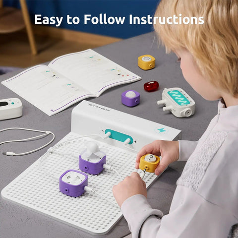 Hands On Circuit Building Kit For Kids With 120 Plus Projects, STEM Toys For Ages 8 To 13, Learn Electronics, Build Real Circuits, Kid Friendly And Absolutely Awesome STEM Activities That Grow With Your Child, child assembling snap-together circuit blocks