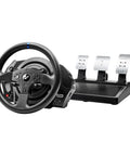 Thrustmaster T300RS GT steering wheel with three-pedal base; black wheel, blue center stripe, silver pedals.