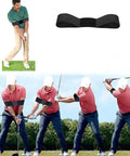 Retractable Golf Swing Trainer For Right Handed Players With Grip Aid And Arm Band In Use On Grass