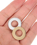 120 Piece M10x20 Flat Washer Kit With Nylon, Brass, And Zinc Plated Washers For DIY Home And Commercial Projects, Leak Prevention And Loosening Resistance, Great For Appliances, Decks, And Hardware Repairs. Brass and zinc plated flat washers in hand