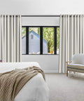 Tension Curtain Rod For Shower And Window Adjustable From 51 To 126 Inches No Drilling No Tools Required Easy Install Rust Resistant Black Rod 1.26 Inch Diameter Ideal For Bathroom Or Closet with white curtains in bedroom setting