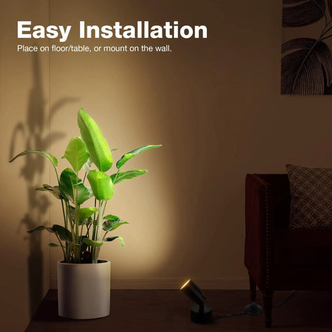 Two Pack Led Indoor Spotlight 120V 3W 3000K Warm White Uplight For Plants And Art Pics illuminating a potted plant in living room