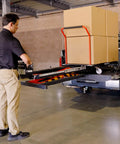Heavy Duty Electric Scissor Lift Table 59 Inch Height Warehouse Workhorse loading cardboard boxes onto a truck.