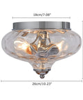 Modern Two Light Hammered Glass Flush Mount Ceiling Light In Chrome Finish, 10.2 Inch Diameter, lighted view.