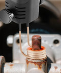 Induction Heater Bolt Removal Kit 1100W 110V Handheld Nut Buster in use on rusty bolt with coil heating, garage tool