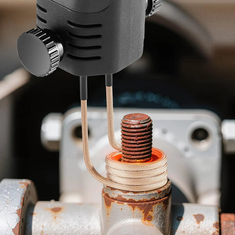 Induction Heater Bolt Removal Kit 1100W 110V Handheld Nut Buster in use on rusty bolt with coil heating, garage tool