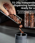 Glass Coffee Bean Storage Tubes Set Of Six With One Way Degassing Valve And Magnetic Stand And Single Dose Espresso Dosing Vials pouring beans