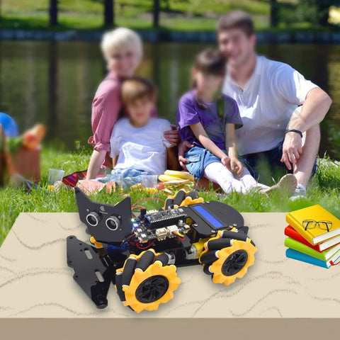 Adeept 4WD robot kit with orange Mecanum wheels and LCD display on black chassis, angled front view