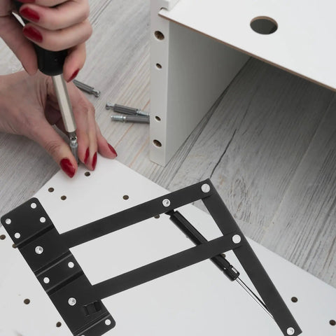 Assembly of Heavy Duty Spring Cupboard Door Hinges Set Pneumatic Folding Lid Support on wooden cabinet, illustrating installation process.