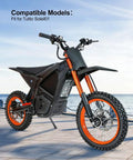 Electric dirt bike with visible orange rims, compatible with Tuttio Soleil, shown on outdoor pavement.