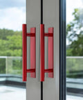 8 Pack Self Stick Push Pull Helpers Round Plastic Cabinet Handles Adhesive Grab N Go Stick On Door Pulls For Kitchen Cabinets Windows Closets Wardrobes Red Durable Grip For Easy Access. Red plastic adhesive window pull handles on glass door.