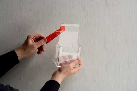 Applying VHB 4910F Clear Double Sided Acrylic Foam Tape for Transparent Bonding on a clear plastic holder, 1.0 mm thick, 19 mm x 11 m roll.