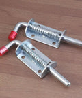 Premium Stainless Steel Spring Loaded Gate Latch And Bolt Hardware Set For Utility Dump Trailers Barn Doors Corrosion Resistant secure locking hardware with red end caps.