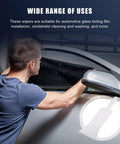 Man using Long Handle Bulldozer Squeegee For Car Windows And Glass Tinting Flat Paddle Scrubber Tool on side window