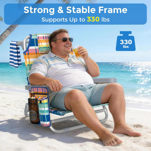 Man relaxing on 'All Day Comfort 5 Position Backpack Beach Chair With Lumbar Support And Ergonomic Backrest' at the beach