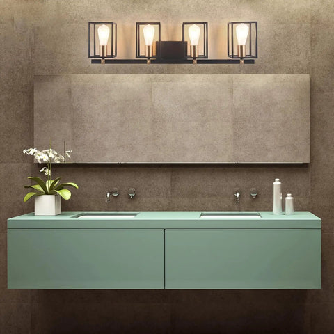Farmhouse Style Four Light Vanity Fixture With Black And Antique Brass Metal Cage in modern bathroom setting