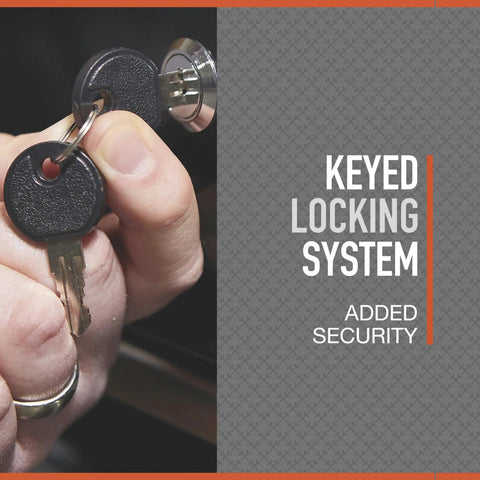 Close-up of hand holding keys unlocking a secure system, emphasizing the keyed locking feature for added security.