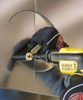 2 Inch To 12 Inch Sheet Metal Hole Cutter Accessory for 1/4 Inch or Larger Drills cutting a hole in galvanised steel for HVACR and roofing pros