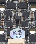 Close-up of BLHeli 32 4 In 1 ESC For FPV Drones showcasing circuitry and components, part of a 20x20 stack design.