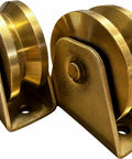 Rock Solid 3.5 Inch Heavy Duty Solid Steel V Groove Industrial Caster Wheel With Secure Locking Brake And Easy Bolt On Mounting Bracket Zinc Coated Finish For Pi Rail And Angle Iron Tracks Two Piece, showcasing a dual pack of bronze-colored caster wheels.