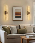 Natural Alabaster Brass Wall Sconce, Modern Indoor Bathroom Vanity Light installed beside a sofa in a cozy living room.
