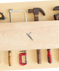 Heavy Duty Spring Plunger Pin With Indexing Lock For Cabinets And Shop Gear on a workbench with tools, steel construction.