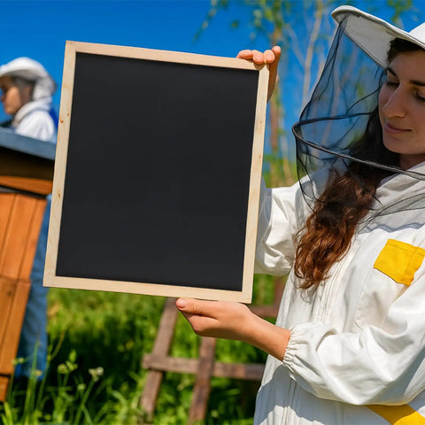 Beekeeper holding 2 Pack 10 Frame Universal Solar Fume Board For Beekeeping, Bee Hive Solar Extraction Aid outdoors