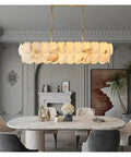 Ceiling Pendant Light, Luxury Natural Marble Design Modern Chandeliers for Living Room Bedroom Dining Kitchen Ceiling Pendant Light Lustre Fixture(Warm Light,L100CM) in a stylish dining room setting.