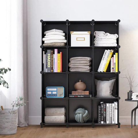 12-Cube Black Storage Organizer Shelf System For Bedroom, Office, And Living Room with assorted items displayed.