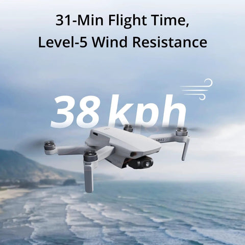 Ultra Lightweight Mini Drone With QHD Video in flight over ocean with text showing 31-min flight time and 38 kph wind resistance.