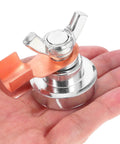 Heavy Duty Magnetic Welding Ground Clamp For Fast Attachment On Metal Rods Posts Railings And Tables held in hand, silver iron build.
