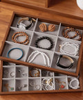 Dope Wooden Velvet Jewelry Organizer Tray With Nine Grid Compartments Stackable Ring Earring Necklace Valet Dish filled with accessories.