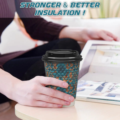 Hella Sturdy Double Wall Paper Coffee Cups With Leak Proof Lids 100 Pack 12 Oz in hand, textured blue insulated drinkware for hot beverages.