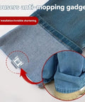 Close-up of 20 Pairs Quick Fix Hem Clips and Reusable Clamps for Pants, showing transparent purple top on denim fabric with metal base.