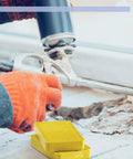 Top Notch Plastic Leveling Shims 300 Pack No Sweat Setup For Tile Floors And Cabinet Adjustment Multi Thickness Wedges Adjustable Support Blocks with yellow wedge in use during installation.