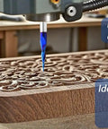 Three Pack Tapered Ball Nose Router Bits One Eighth One Sixteenth One Thirty Second Inch Cutting Diameter One Quarter Inch Shank Sweet Nano Blue Coated Up Cut Solid Carbide CNC Bits For 2D And 3D Carving Two And A Half Inch Overall Length shown carving wood.