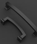 Two matte black cabinet pulls displayed on a textured surface, focus on 4-inch size, pack of 10, kitchen hardware, durable metal construction.